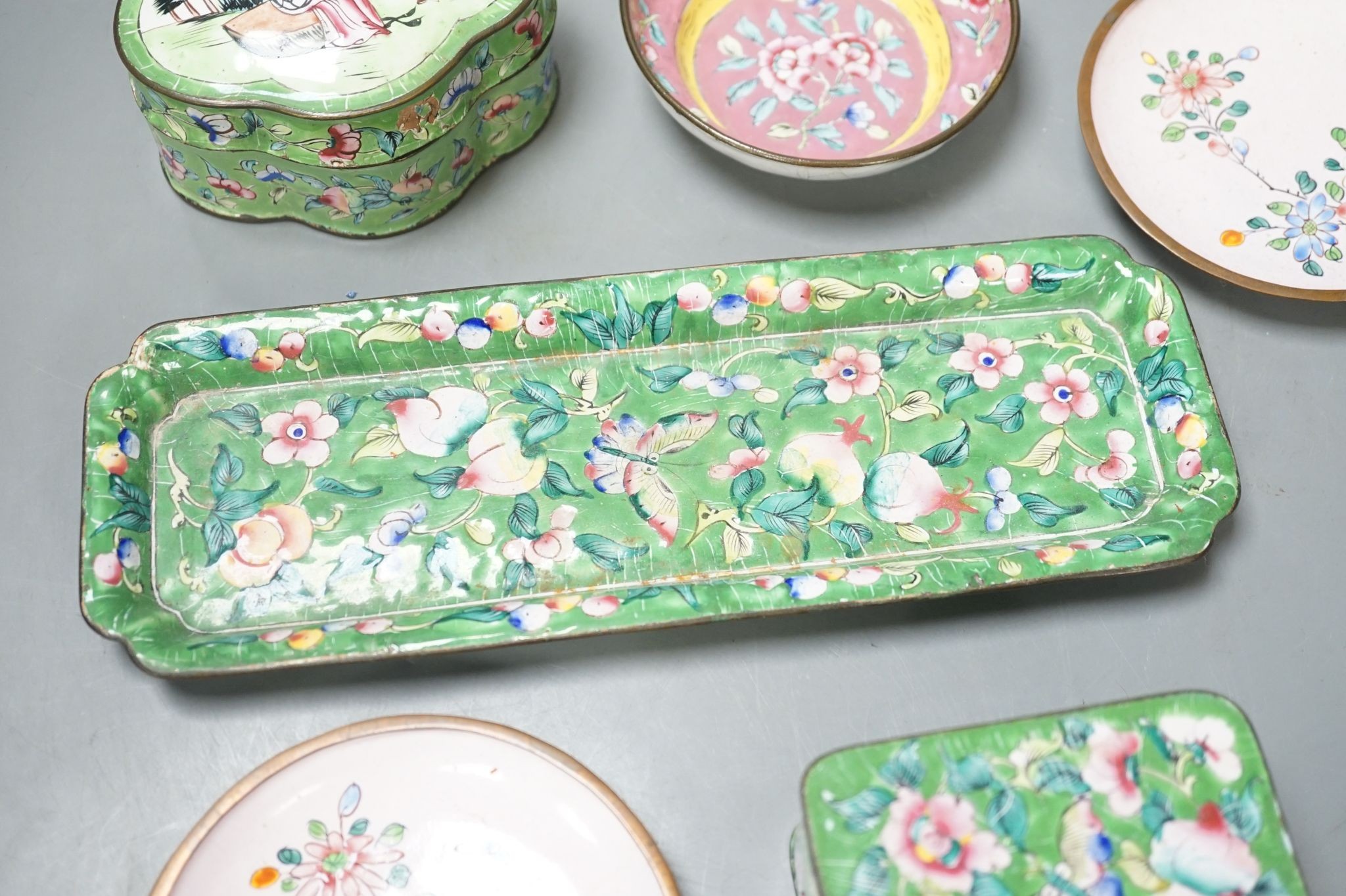 A group of Chinese Canton enamel dishes and two boxes and covers, 24cm